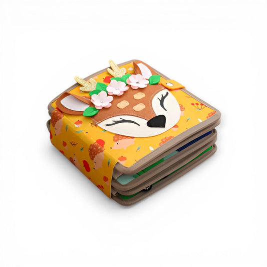 Montessori busy board quiet book deer edition, orange felt animal book with cute deer face flowers and decorative elements on cover, sensory activity book for toddlers and preschoolers aged 12 months and up.